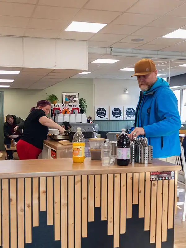 Handcrafted trainees working in a cafe