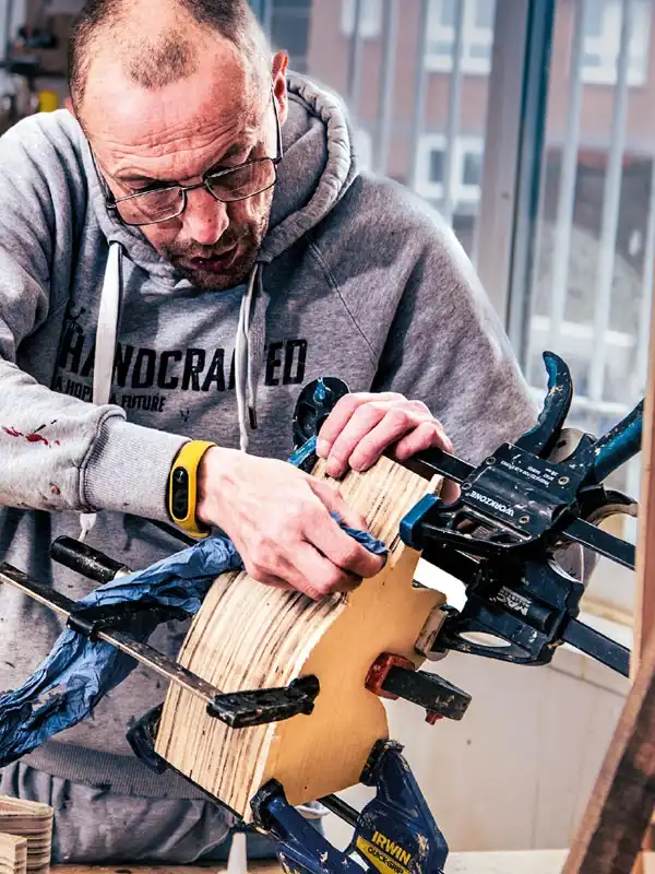 A man working on a woodwork project